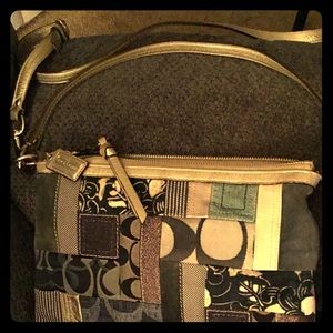 Multi shades of blue and beige Coach purse.